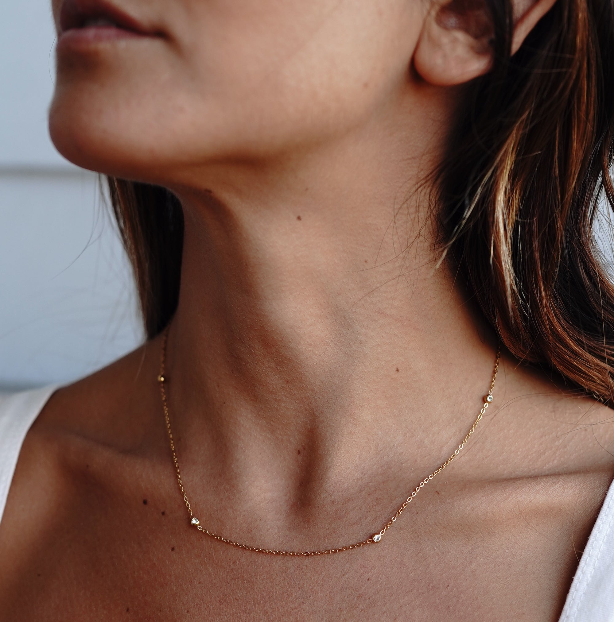 Model is wearing Dorota Zirconia Gold Necklace