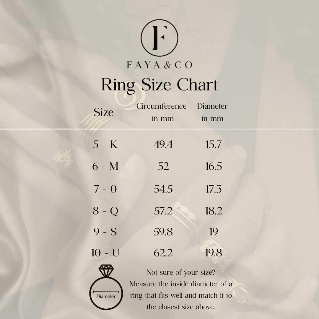 Ring size chart with measurements on a soft background