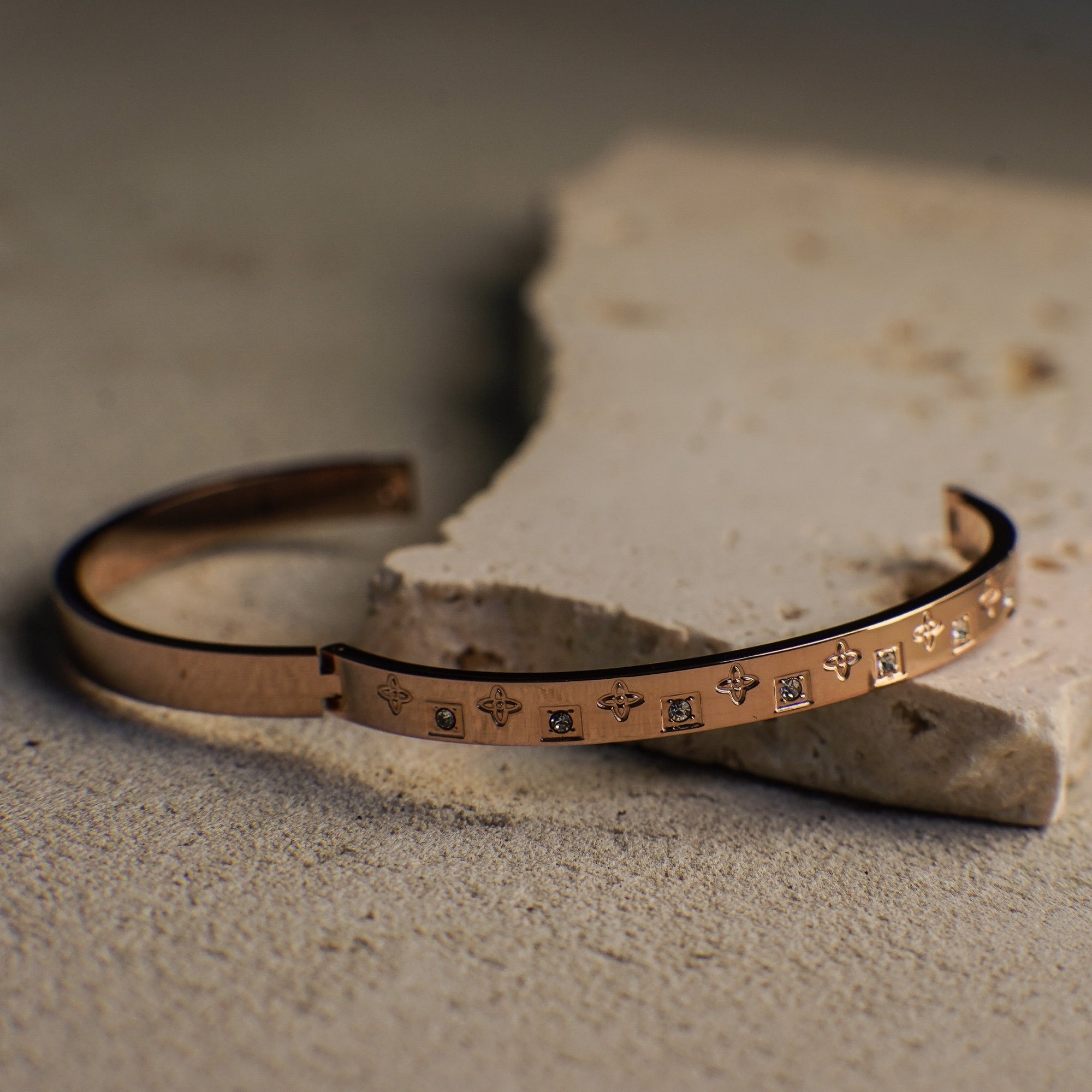 Decorative leather belt with engraved patterns on a textured surface