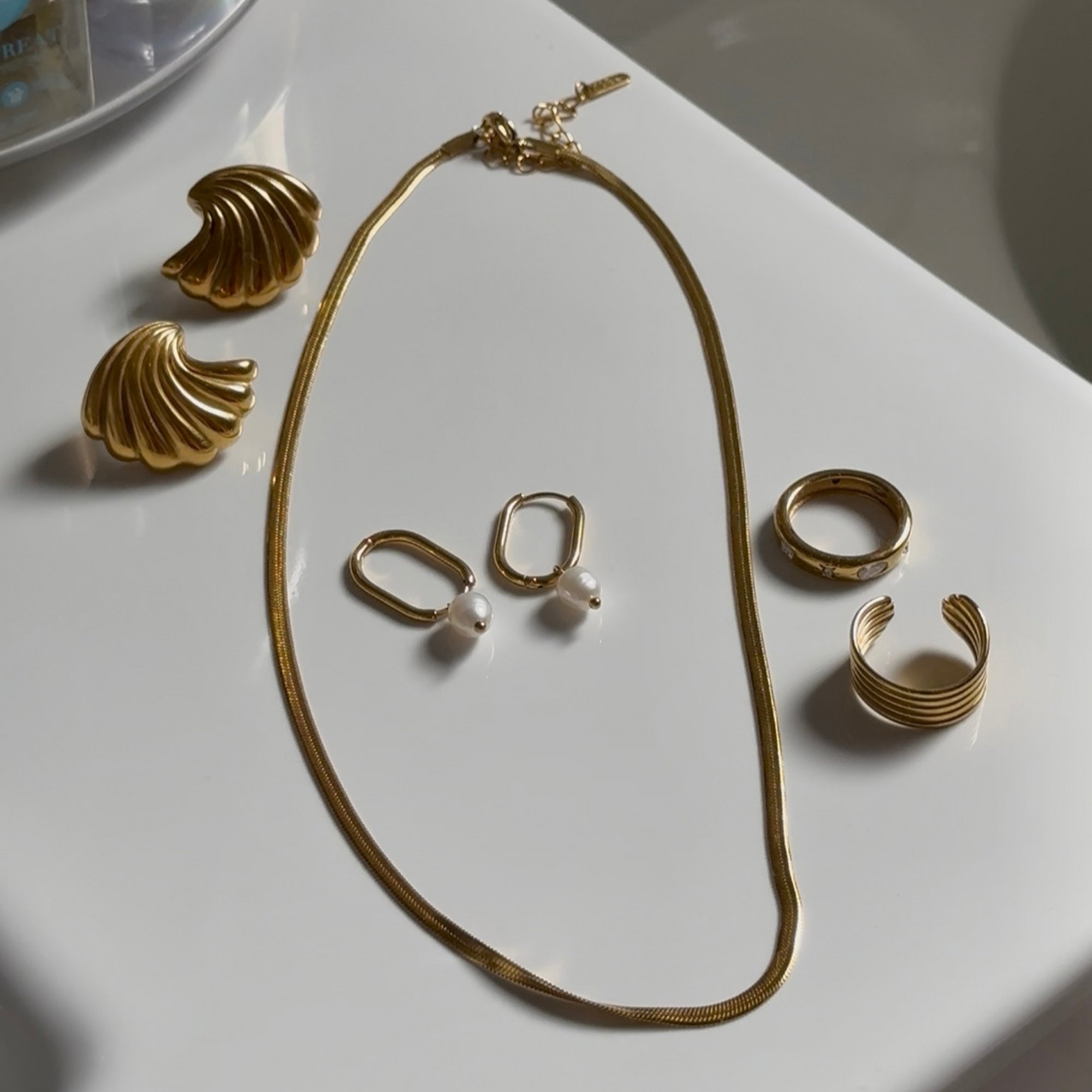 Mara Gold Pearl Earrings with other jewelleries