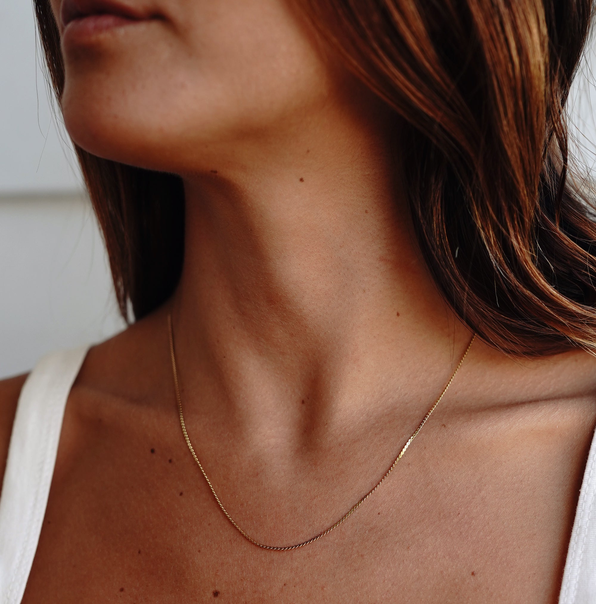 Olivie Twisted Gold Necklace on a model's neck