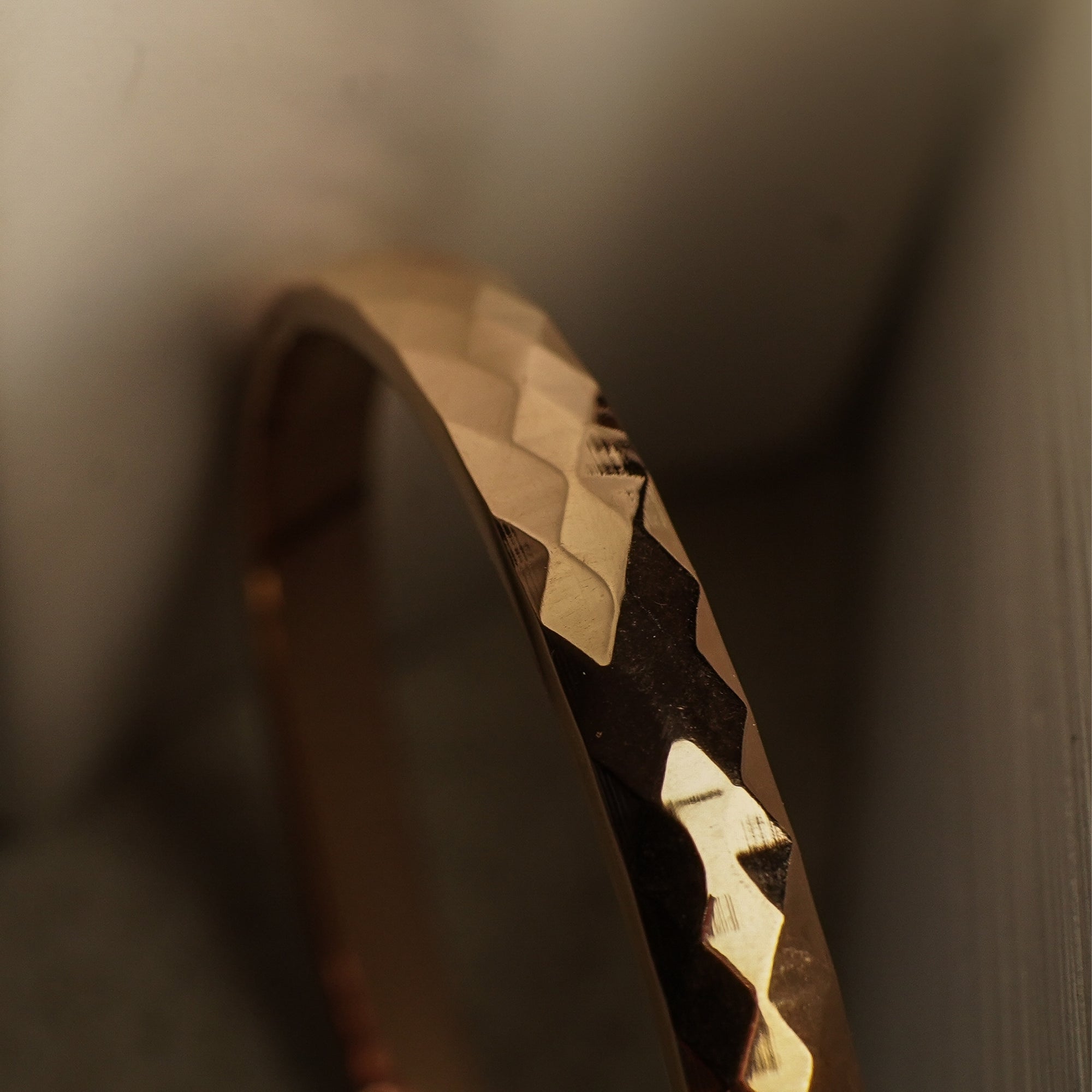 Close-up of a gear with a blurred background